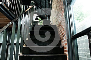 Metal stairs in the coffee shop, interior or modern concept.