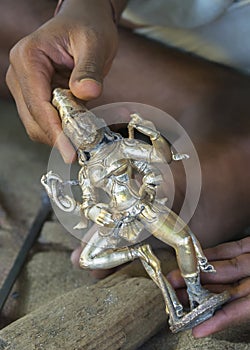 Metal statue as it came out of clay cast.