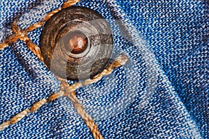 Metal stave on jeans