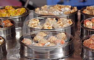 Metal Steamers with Dim Sum Dishes