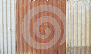 Metal steel strips. Rusty corrugated iron metal, Zinc steel wall, pattern texture background. Close-up of exterior architecture