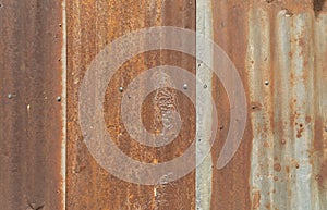 Metal steel strips. Rusty corrugated iron metal, Zinc steel wall, pattern texture background. Close-up of exterior architecture