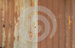 Metal steel strips. Rusty corrugated iron metal, Zinc steel wall, pattern texture background. Close-up of exterior architecture