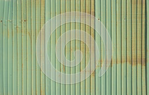 Metal strips. Rusty corrugated iron metal, Zinc steel wall, pattern texture background. Close-up of exterior architecture material
