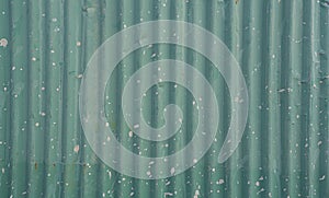 Metal strips. Rusty corrugated iron metal, Zinc steel wall, pattern texture background. Close-up of exterior architecture material