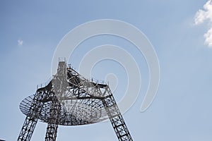 The metal structure of the astronomical radio telescope observatory on the territory of the Institute of the Ionosphere