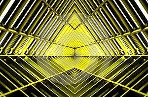 Metal structure similar to spaceship interior in yellow light.