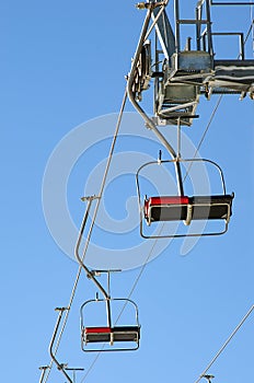 Empty seats of ski lift