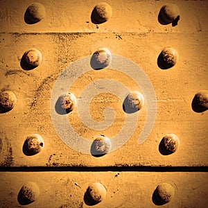 Metal surface with rivets