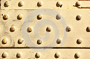 Metal surface with rivets