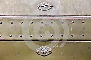 Metal surface with rivets