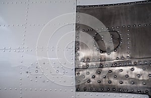 Metal surface texture with rivets