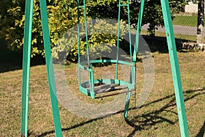 A metal swing from the early 1980s.