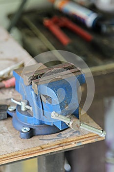 Table vise clamp on table