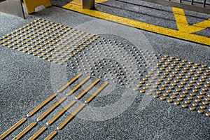 Metal tactile paving for blind people in big city