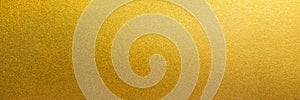 Panorama smooth shiny gold texture background. Panoramic gold texture surface photo