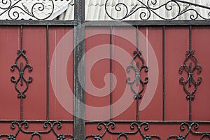 Metal texture of forged black rods with a pattern