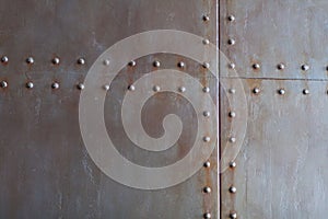 Metal texture with rivets