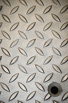 Metal texture of stainless steel floor plate with bumped diamond pattern