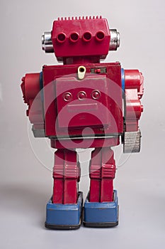 metal toy robots from the year 1950, battery operated, artificial intelligence, robotics concept, on gray background