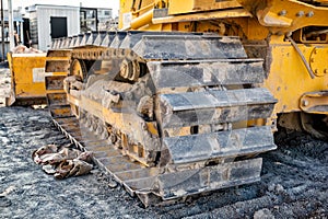 Metal Tracks on a Bulldozer on Construction Site