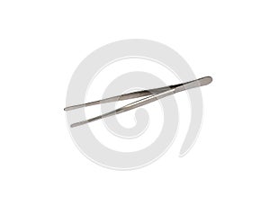 a metal tweezers isolated