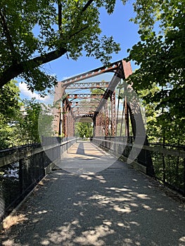 Metal walkway bridge over rogue river