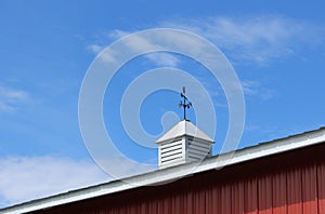 Metal weathervane decorates the roof