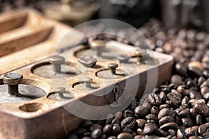 metal weights and coffee beans