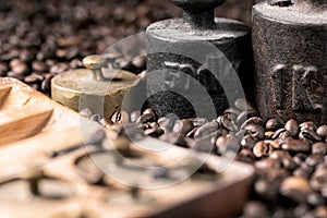 metal weights and coffee beans