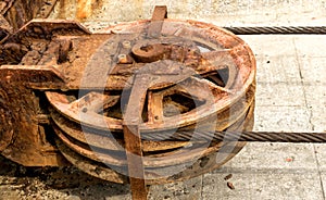 Metal wheel of a old shipyard ramp disused