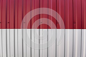 Metal white and red sheet for industrial building and construction. Roof sheet metal or corrugated roofs of factory