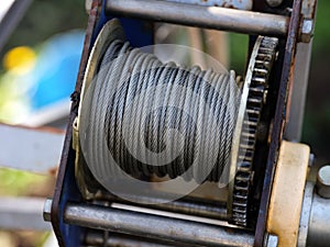 Metal winch coil with steel cable wire on it