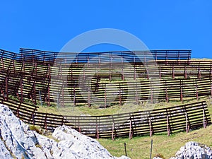 Metal and wooden structures for protection against avalanches on Mount Matthorn in the Pilatus mountain massif, Alpnach