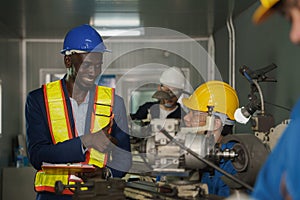 Metal work factory technician inspector and worker in lathe workshop