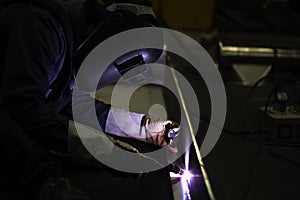 Metal workers use manual labor, Skilled welder, Factory workers making OT