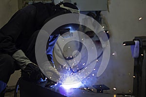 Metal workers use manual labor, Skilled welder, Factory workers making OT