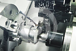 Metal working. cutting tool pefroming turning operation at cnc machine