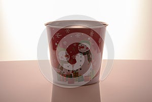 Metal zink Christmas buckets snowmans red background