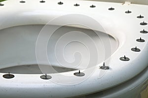 Metall circle sharp buttons on the top of toilet