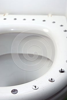 Metall circle sharp buttons on the top of toilet