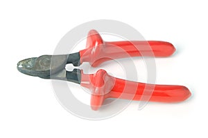 Metall wire cutters with red rubber handles isolated on white background