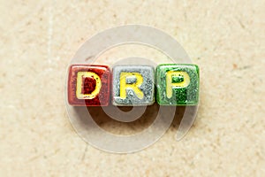 Metallic alphabet letter block in word DRP Abbreviation of Disaster recovery plan, Distribution resource planning, Dividend