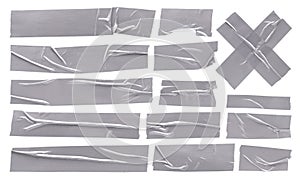 Metallic aluminum reinforced tape  set of silver sticky crumpled torn strips of scotch tape on white background