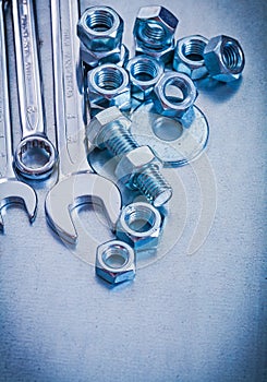 Metallic background with hook wrench flat spanner