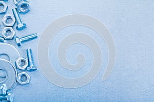 Metallic background with screwbolts bolt washers