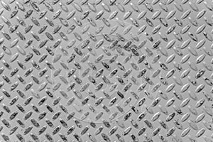 Metallic background. A steel plate with spikes as an abstract background.