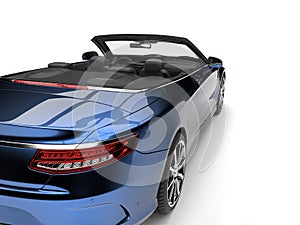 Metallic blue modern luxury convertible car - taillight cut shot