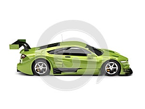 Metallic bright green modern super sports car - side view