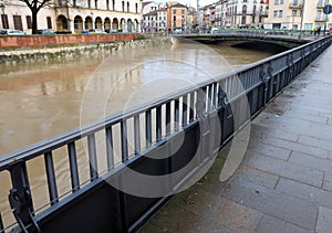 very long metallic bulkheads to protect Vicenza City in northern Italy during the flood in winter photo